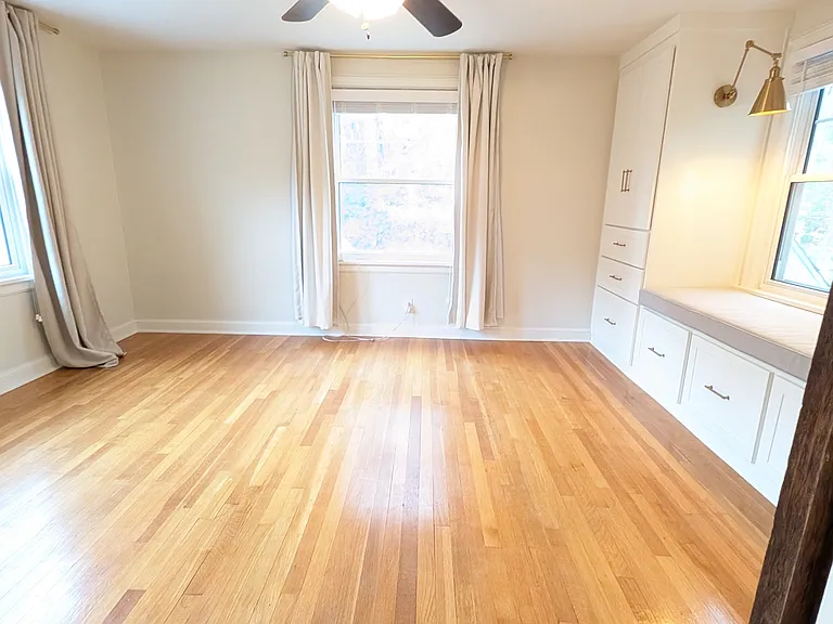2nd bedroom upsairs. Custom built-ins with extra deep drawers.