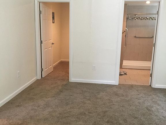 Looking at Walk-in Closet and Bathroom from Bedroom