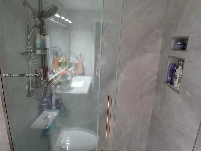 5099 NW 7th St #303 — Photo 21