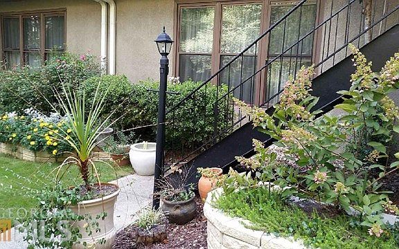 Beautiful Landscaping along Front Walkway.