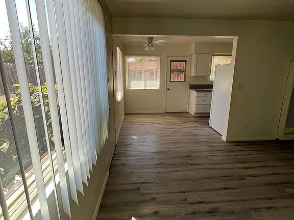 Living room with attached dining space into kitchen
