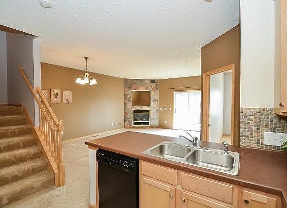 You will love the open floor plan with the corner kitchen facing the living and dining area.