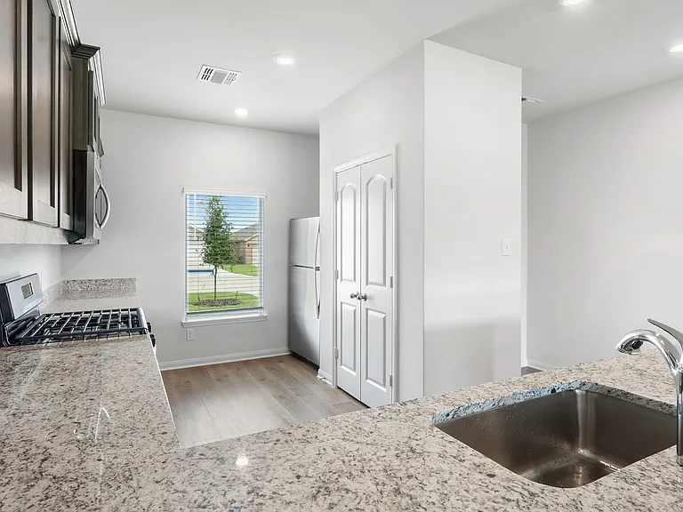 The kitchen has a wonderful window that lets in great natural light.