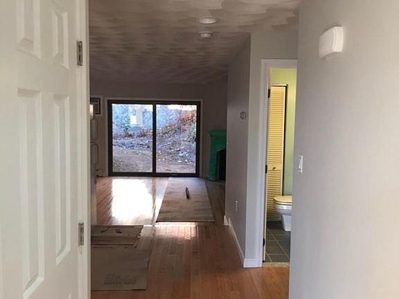 First floor hallway with closet