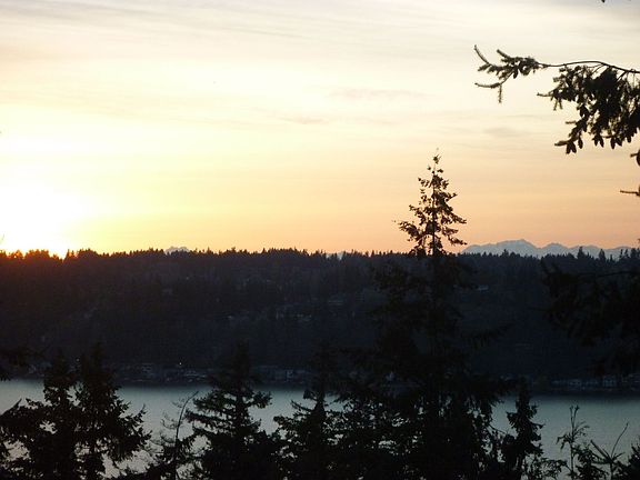 View of Lk Samm and Olympics at Sunset