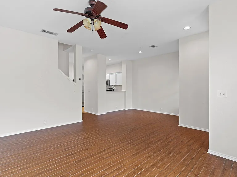 Another view of your living room, dining area, breakfast bar.