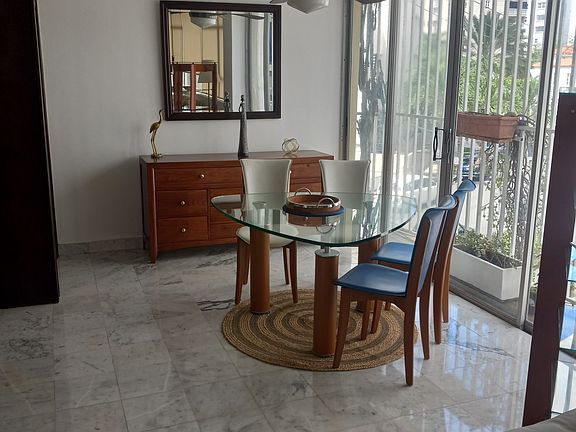 Dining area with balcony doors
Looking out to Santiago Iglesias Street