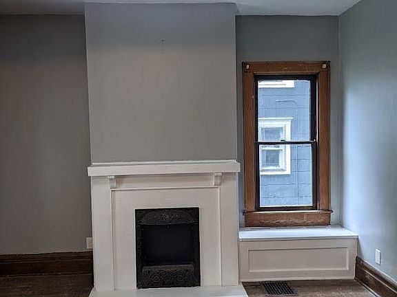 Living room, mantle and window seat