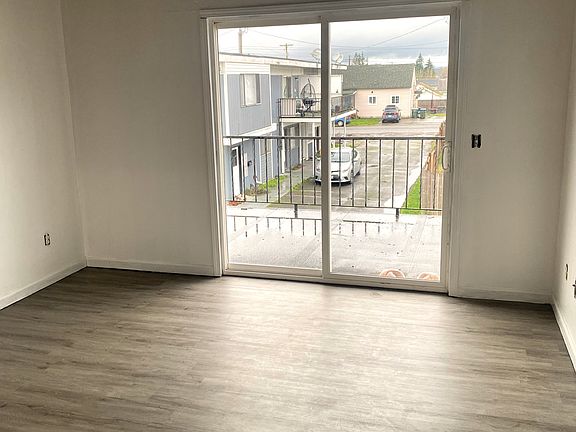The living room opens up to a balcony.