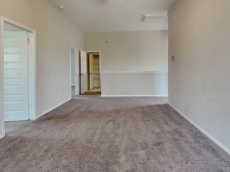 Brightly lit, spacious room wi