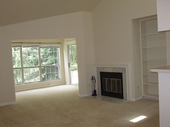 living room with sun room in the back