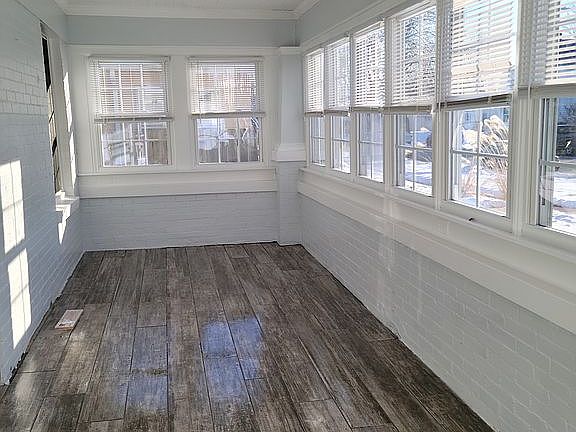 Enclosed heated front porch