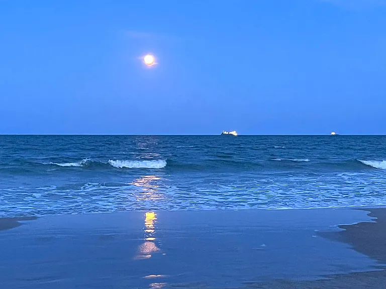 Evening walks aren't bad either. Watch the moon reflect off the ocean and let your stress melt away.