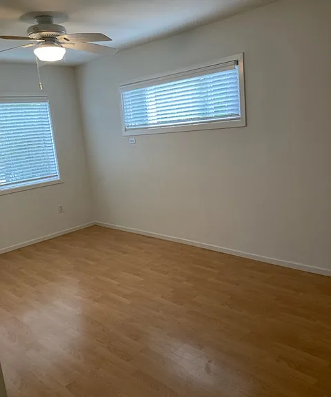 Large Master with ceiling fan, lots of light