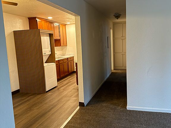 Entrance from living room towards kitchen and bedrooms