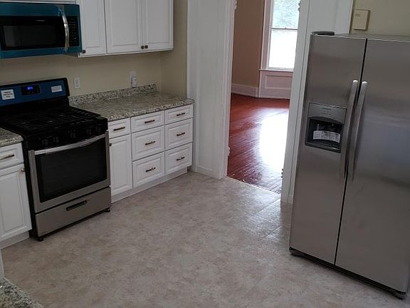 Plenty of cabinets, drawers, counter space, and room for a table and chairs