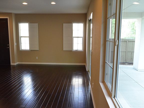 Living and dining room. Covered patio to the right