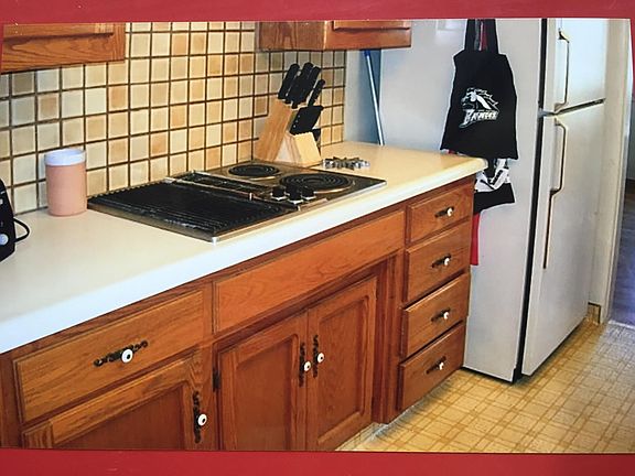 Jennifer-air down draft stove. Recessed lighting under cabinets. Fridge is Not included. New floors not pictured are wide plank LVT flooring.