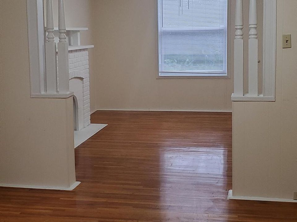 Looking into the front two rooms, beautiful hardwood floors. Very large hanging closet in the front room.
