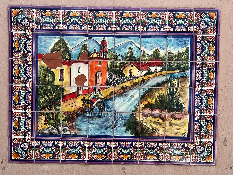 Hand-painted tile mosaics throughout.