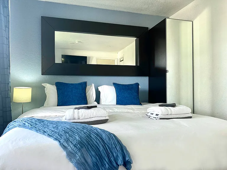 Choose between 1 King Bed or 2 Twin Beds and 1 Twin Bed for a comfortable stay.