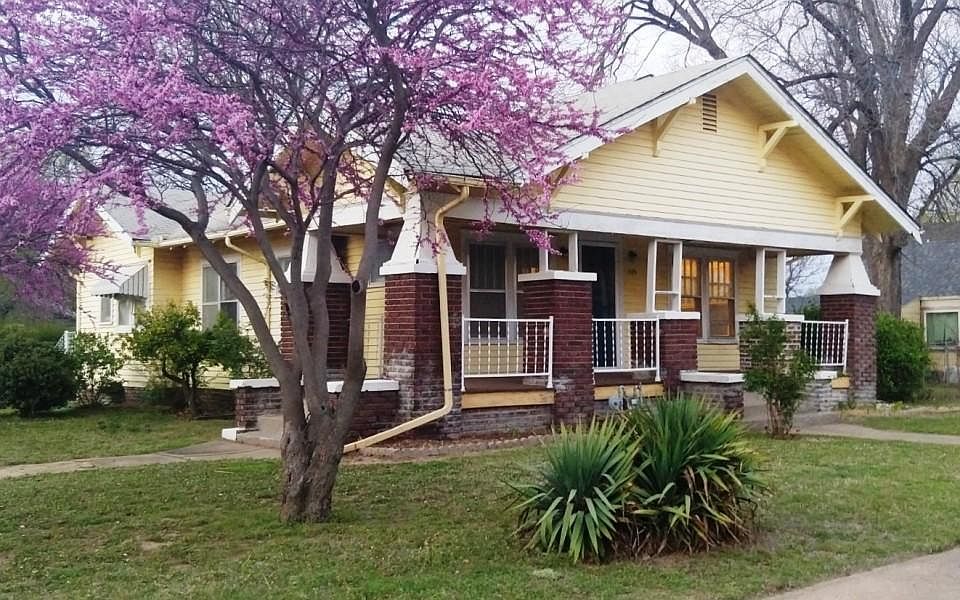 Front Entrance with Redbud Tree and Yucca.