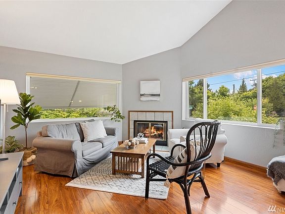 Relax around the gas fireplace in the living room.