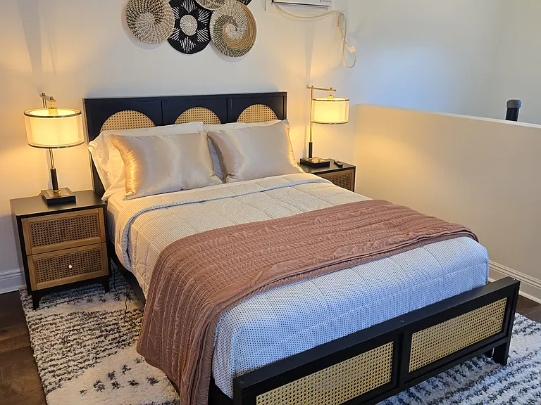 Comfortable mattress, dimmable lamps with charging ports for electronics. Cord included for comvenience. Brand new remote controlled air/heating unit
