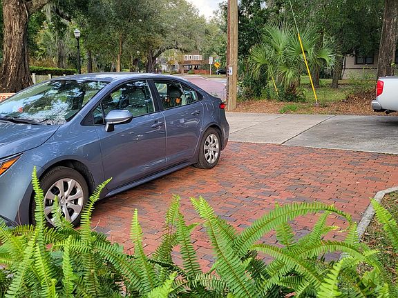 Brick- OVER FLOW parking area for additional vehicles and guest parking