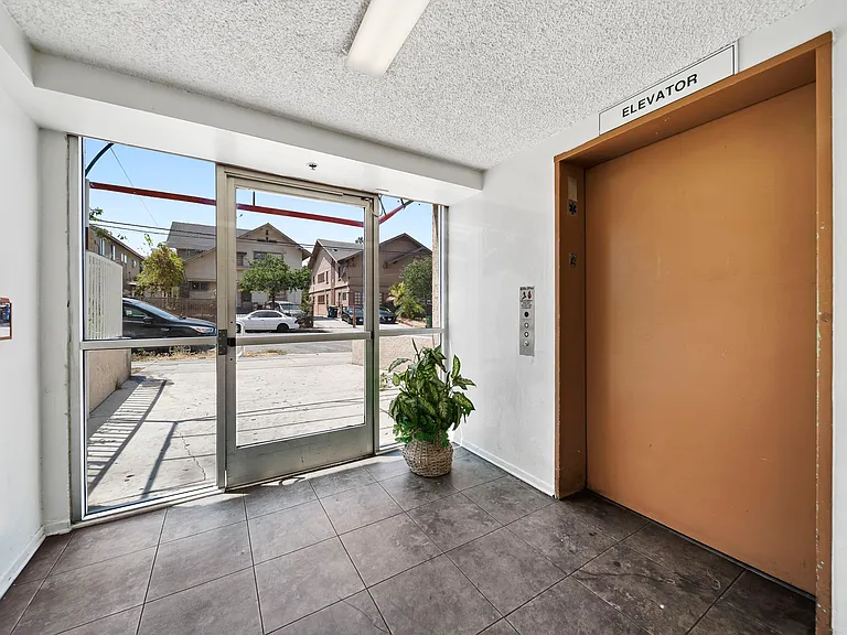 Community entry with convenient elevator access and natural light.