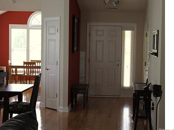 Open foyer with hardwoods