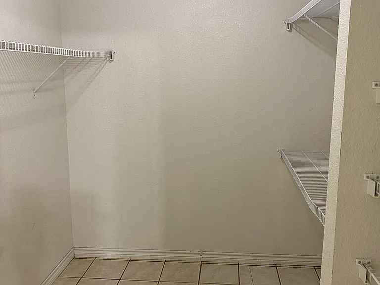 9' x 7' walk-in closet, similar to this photo- but with vinyl plank flooring