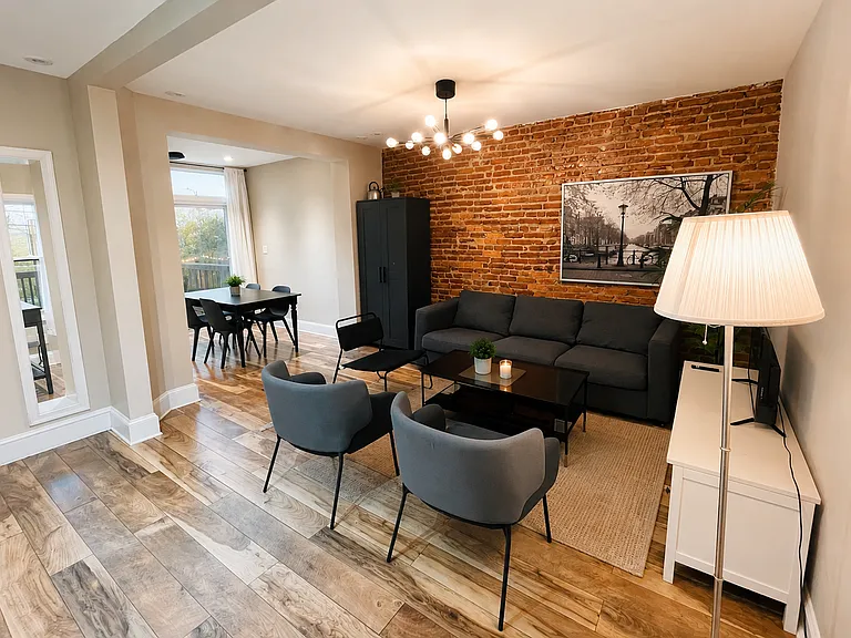 Living and dining rooms. Most the pictured furnishings available with rental at no additional cost.