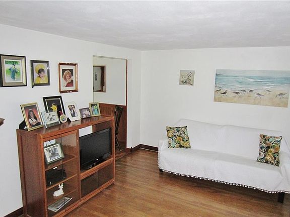 Nice Spacious Living Room, Open to Dining Area With Beautiful Hardwood Floors!