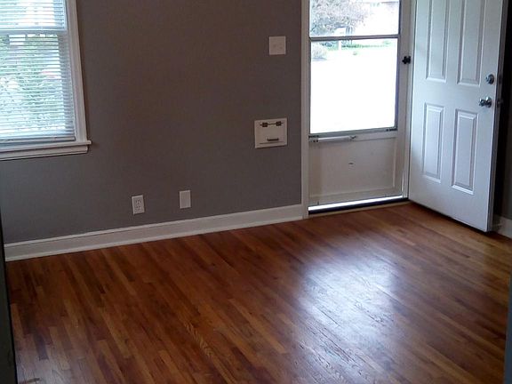 Entry / Living Room with original hardwood floors