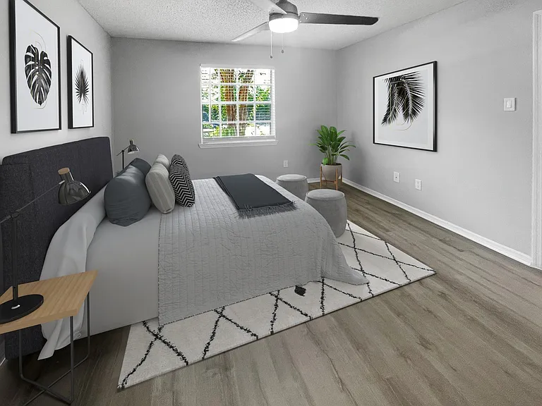 Bedroom with wood plank style flooring