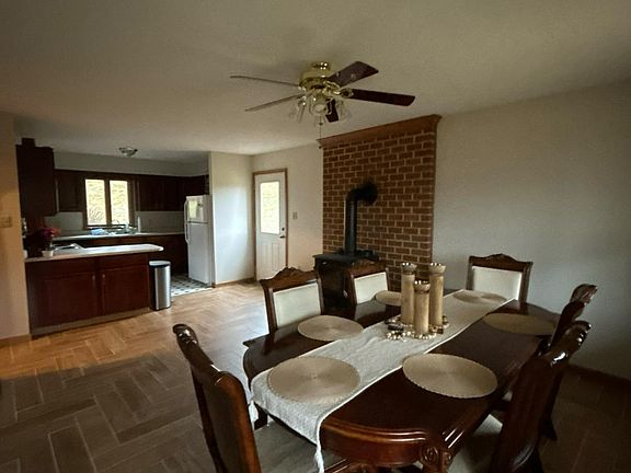 Dining room and kitchen, with kitchen attached to the entry room
