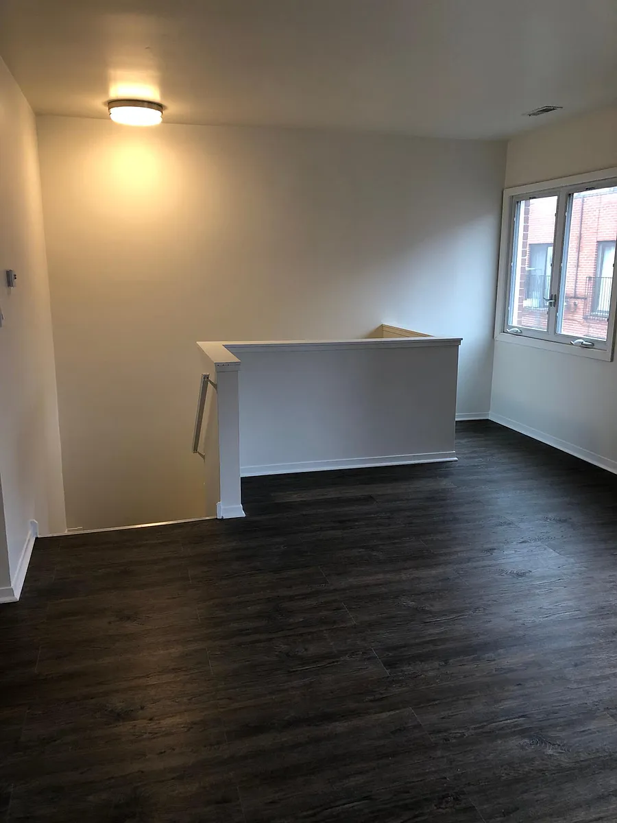 From entryway up the stairs to living areas. - 2305 S Stewart Ave #L