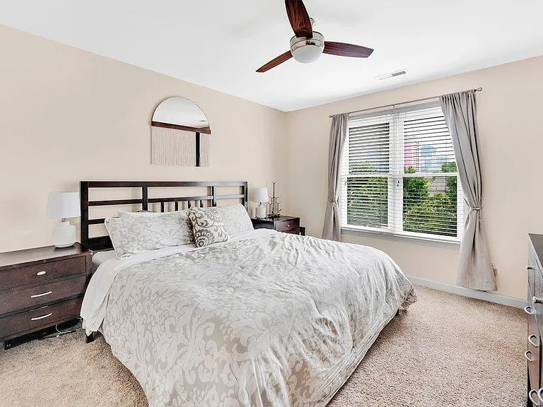 Large master bedroom with walk-in closet (king size bed pictured)