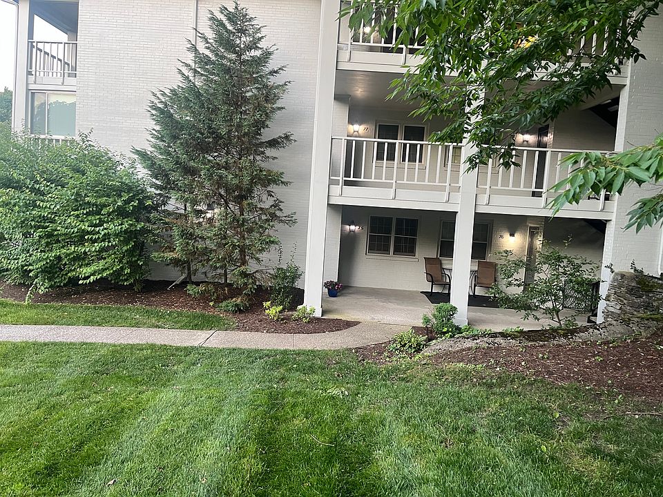 Condo entry on the left, no stairs into this condo, only 4 steps with railing from covered assigned parking