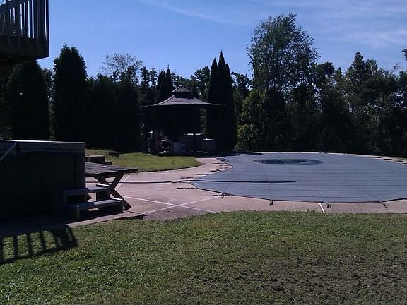 view of pool from yard