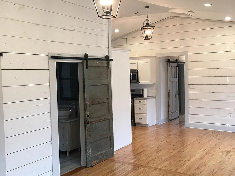 Bathroom door and high ceilings