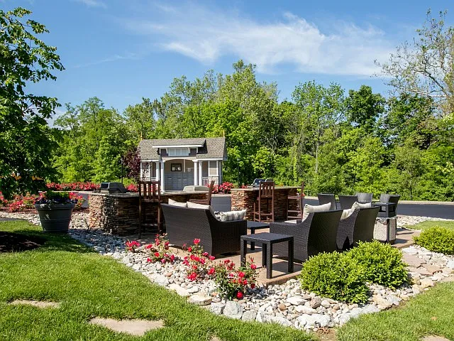 outdoor grill and lounge area at Water's Bend Apartments