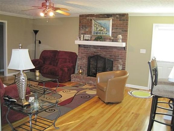 Fireplace with gas logs in living room