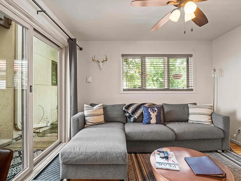 Living room and entrance via patio door