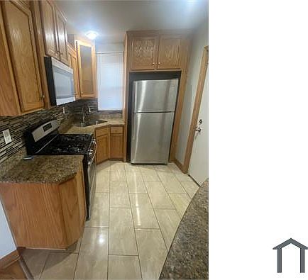 2nd image of 9204 S Saginaw Ave #2