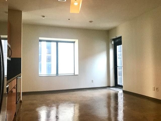 Vaulted 16ft ceilings allows for ample amount of natural lig