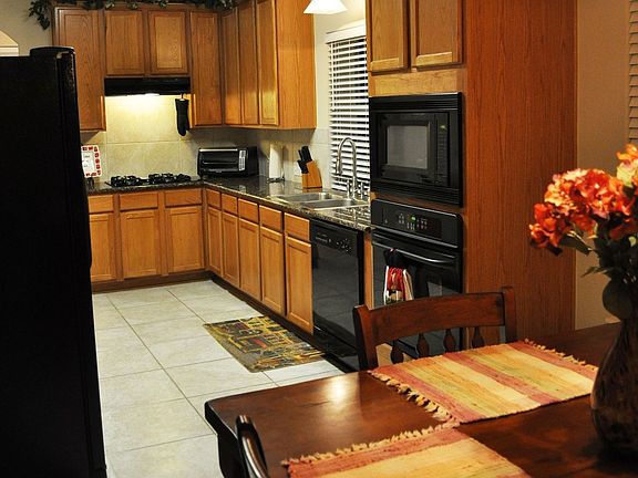  Open floor plan with kitchen and breakfast area open to family room.  