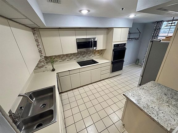 2nd image of 4112 W Palm Aire Dr APT 122B