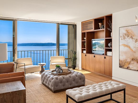 
                    Looking back the other way, you can see the handsome built-in cabinet with room for your TV, book & interesting objects. The "grill in the upper left side of this cabinet houses the Mitsubishi "mini-split" unit. This in throughout the home and provides both A/C and heat....
                